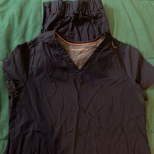 One pair black one pair navy blue iMotion scrubs